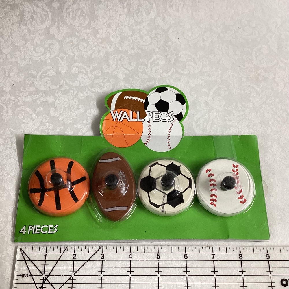 Set/4 Wall Pegs:  Baseball, Soccer, Basketball, Football.  new